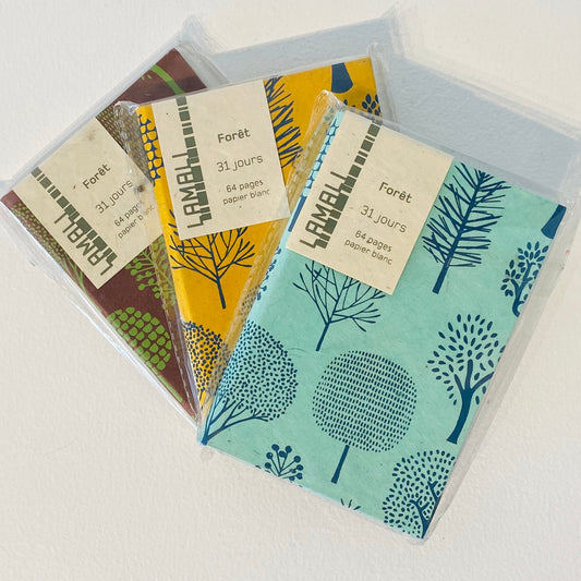 These blank paged small journals are perfect for any pocket.  Hand made in Nepal in various designs and colors.